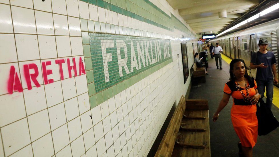 "Aretha" is spray painted next to a sign at the Franklin Avenue subway station, in memory of singer Aretha Franklin, in the Brooklyn borough of New York, U.S. August 16, 2018.