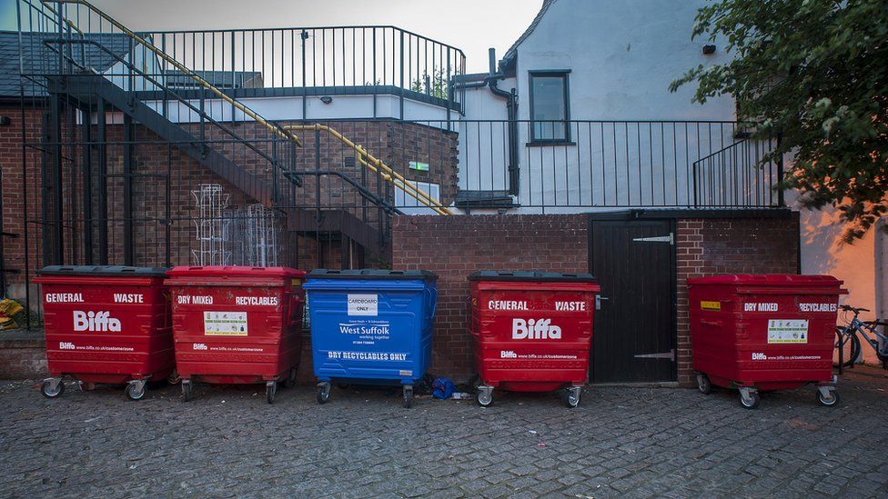 Large bins in the bin loading area in Bury St Edmunds
