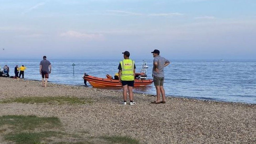 Beach rescue on West Mersea beach in Essex