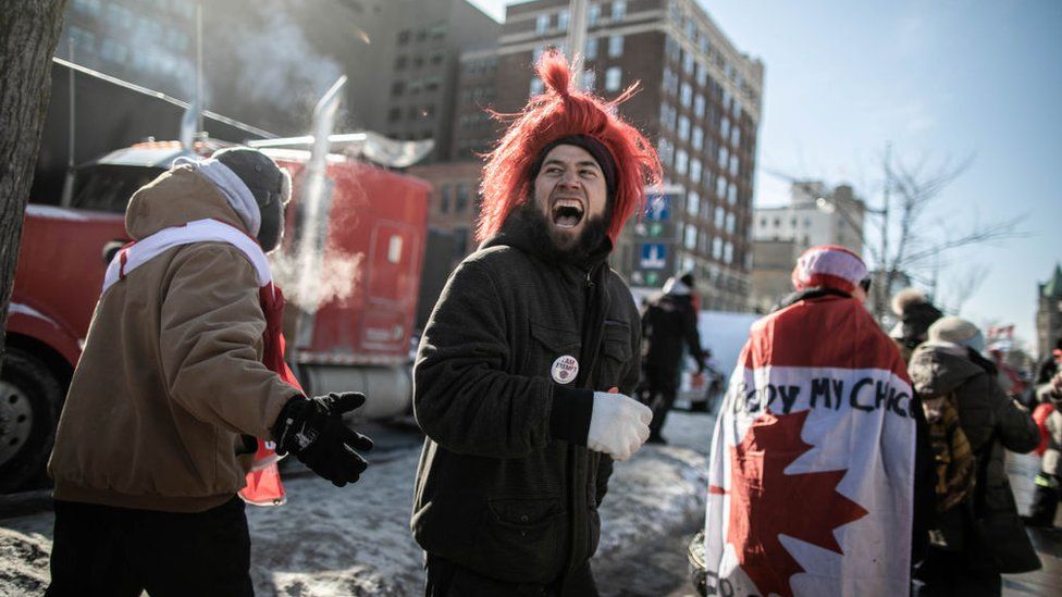 Protestors continue their demonstration against the coronavirus vaccine mandates in the country, in Ottawa, Canada on February 13, 2022