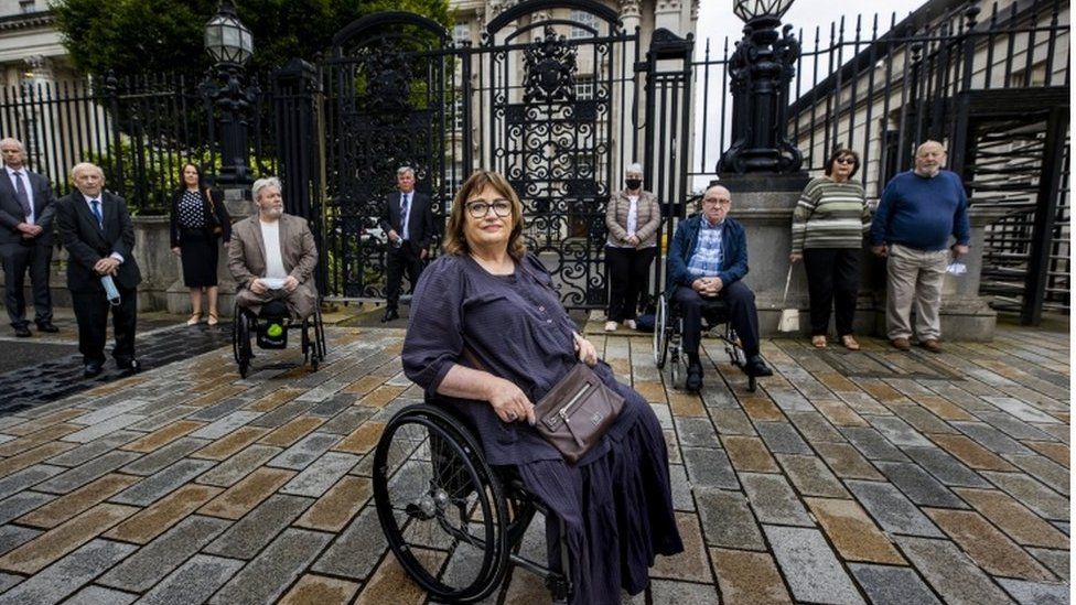 Jennifer McNern (centre) outside Belfast High Court On Monday