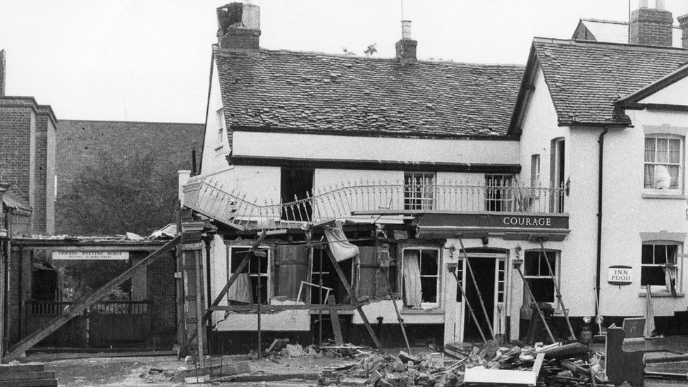 The aftermath of an IRA bomb at the Horse and Groom pub in Guildford, Surrey