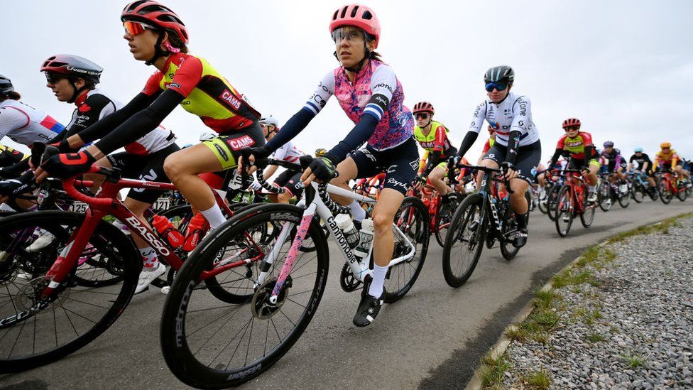Female cyclists racing in the Women's Tour 2022