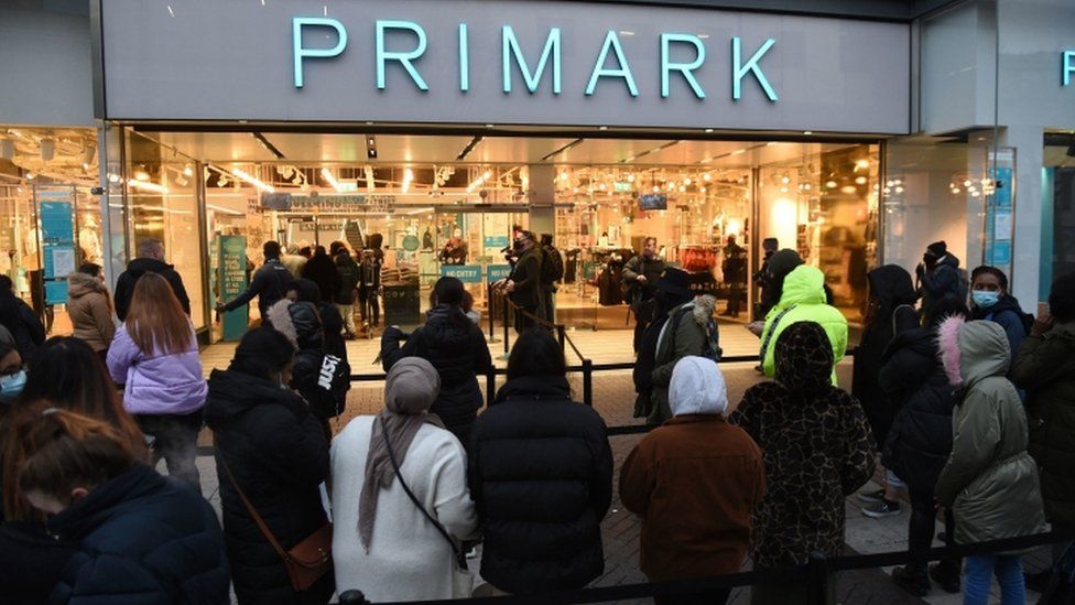 Customers queued up outside the Primark store in Birmingham before it opened at 07:00 BST