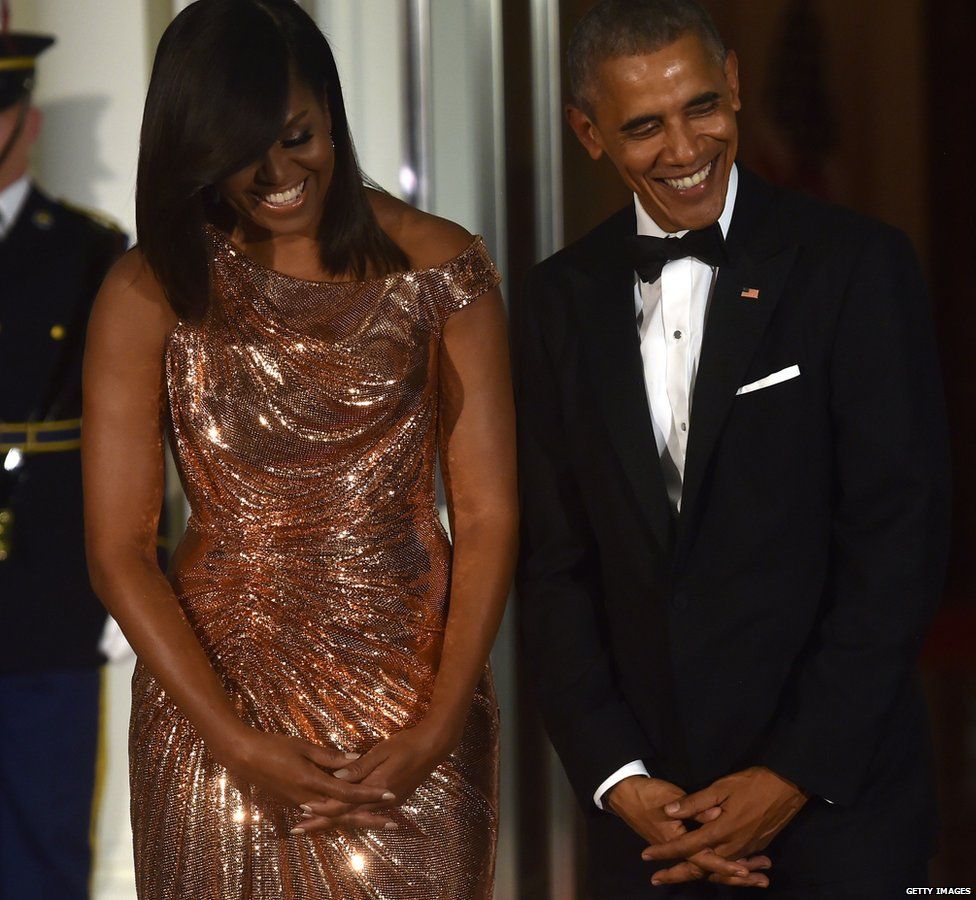 Мишель и Барак Обама проводят свой последний государственный ужин