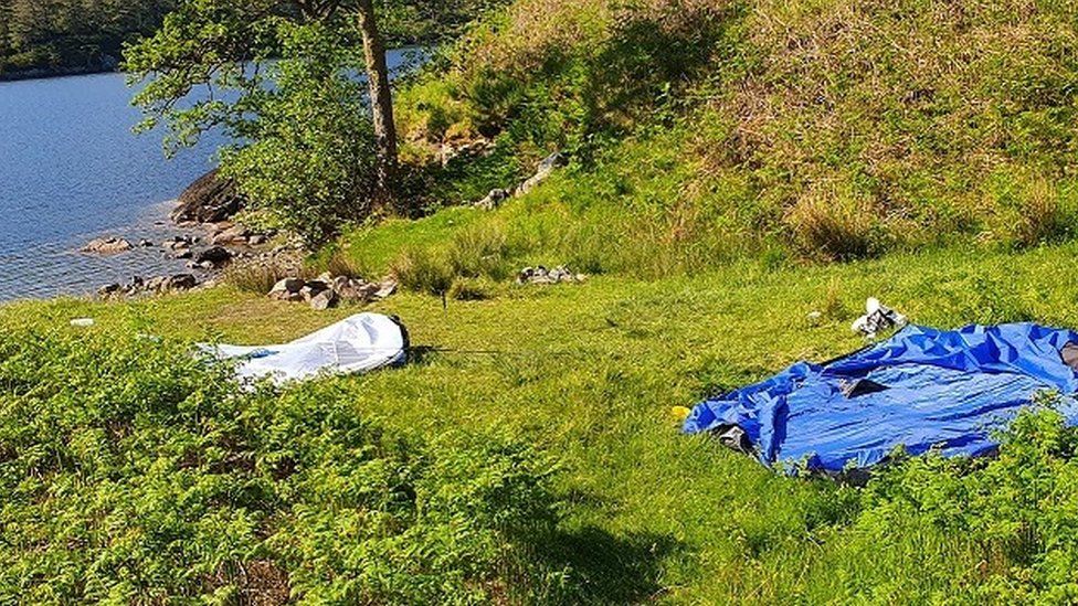 Abandoned tents at Loch Arkaig in Lochaber