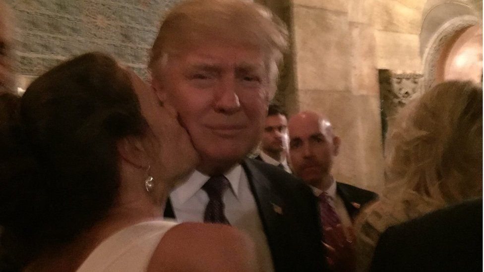 Trump being kissed by a bride