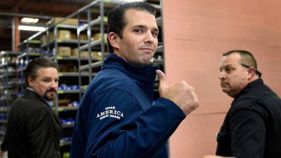 Donald Trump Jr gives a thumbs up at a rally for his father in November 2016