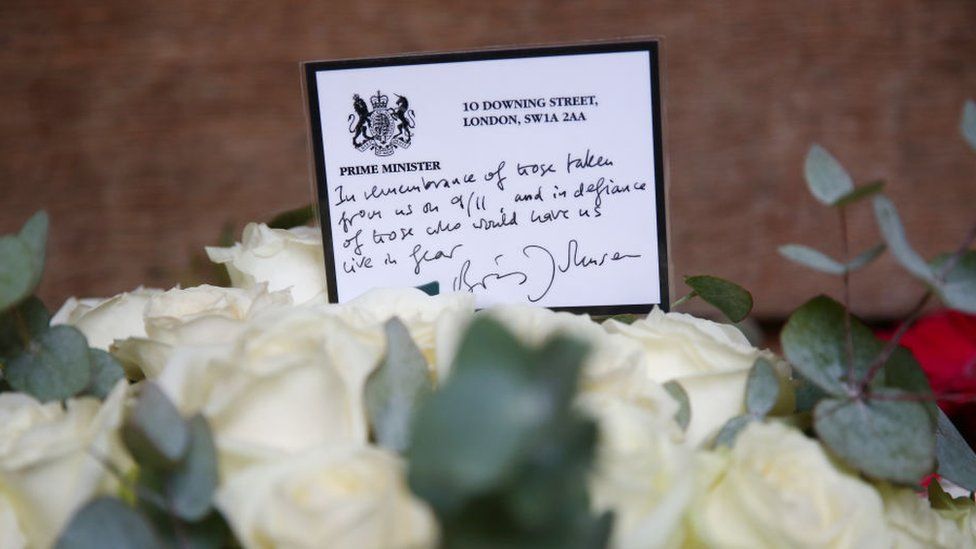 A message left by PM Boris Johnson at the September 11 memorial garden