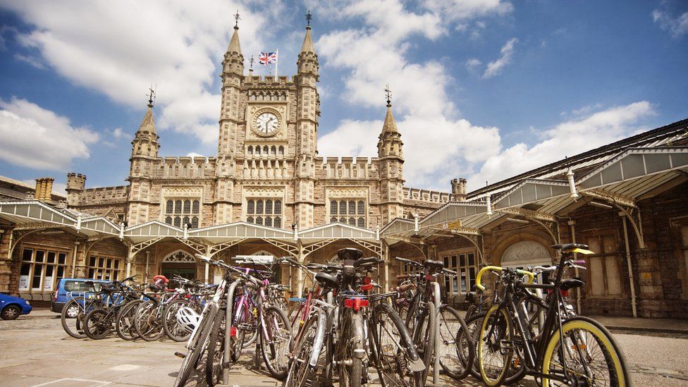 The main front entrance to Bristol Temple Meads with bicycles in the background
