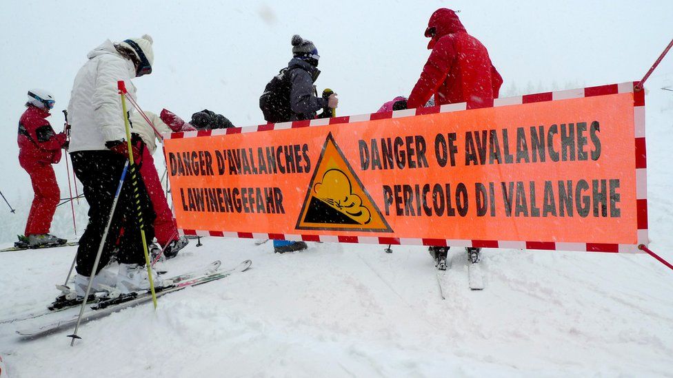 An avalanche warning banner in eastern France