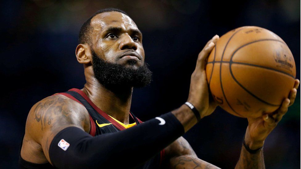 LeBron James attempts a free throw against the Boston Celtics during the first quarter of game five of the Eastern conference finals of the 2018 NBA Playoffs, 23 May 2018