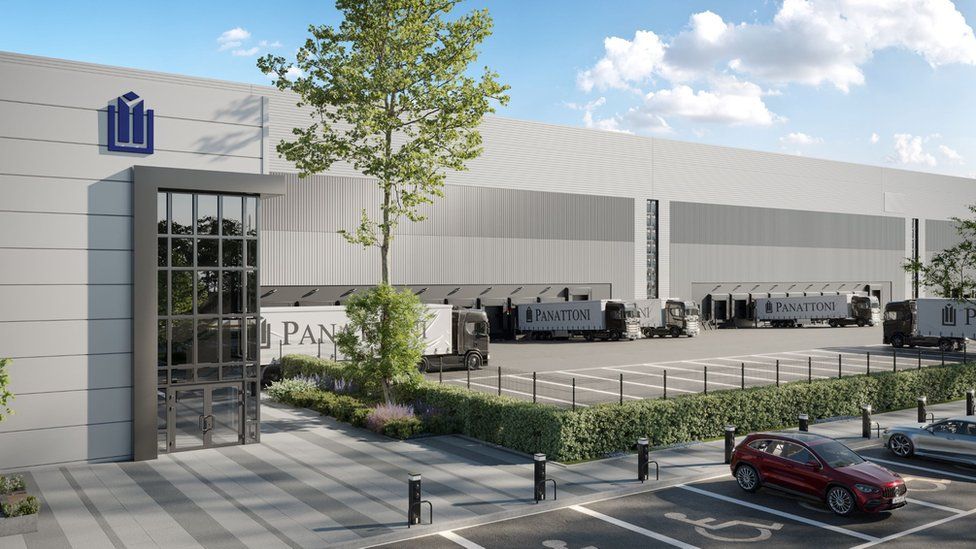 Artist's impression of the completed Panattoni site - a large grey building with Panattoni branded lorries parked outside