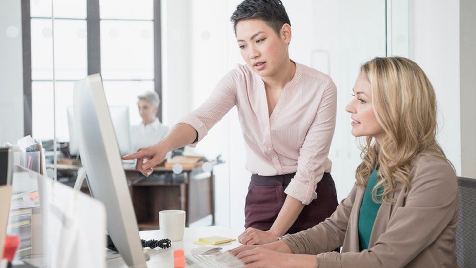 Women at a computer