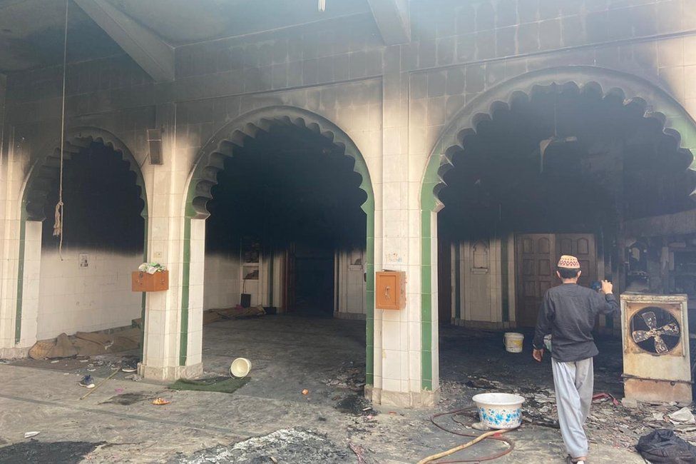 A partially burnt mosque in Delhi's Mustafabad
