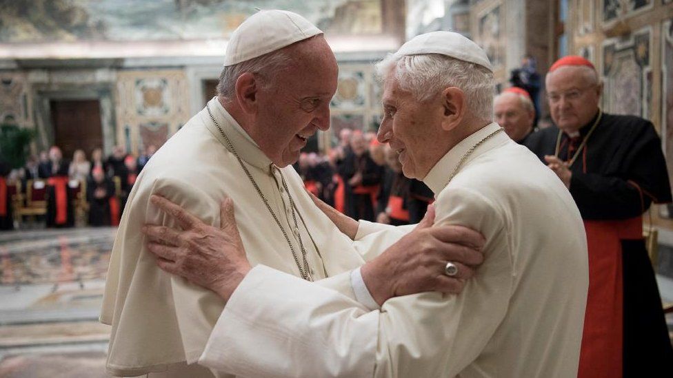 Former pope Benedict (R) is greeted by Pope Francis during a ceremony to mark his 65th anniversary of ordination to the priesthood at the Vatican June 28, 2016