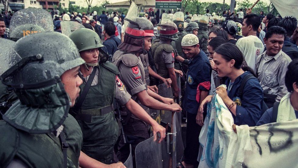 Protesters and police at Trisakti University in Jakarta in 1998