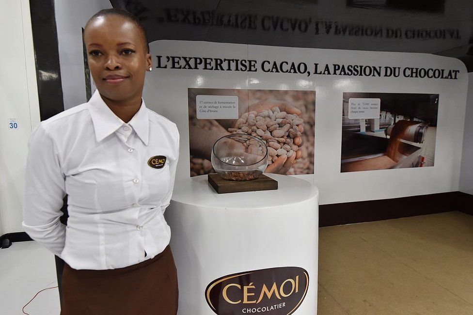 A member of staff is seen during the inauguration of the French chocolate manufacturer CEMOI factory in Abidjan
