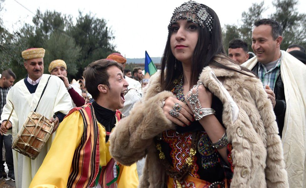 Algerian Berbers celebrate the Yennayer New Year in Ath Mendes, south of Tizi-Ouzou, east of the capital Algiers, on January 12, 2018. The Berbers - an ethnic group descended from the pre-Arab populations across North Africa - are currently celebrating their New Year festivities. Today - for the first time - the Yennayer New Year is being marked as a national holiday in Algeria.