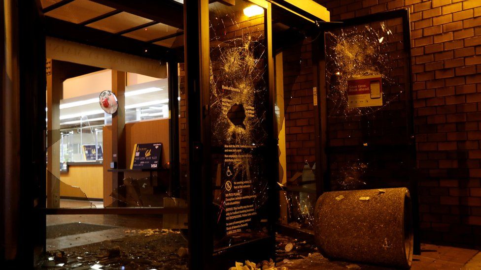 A vandalised Bank of America office in Berkeley, Calfornia, after protests against Milo Yiannopoulos's university talk got out of hand