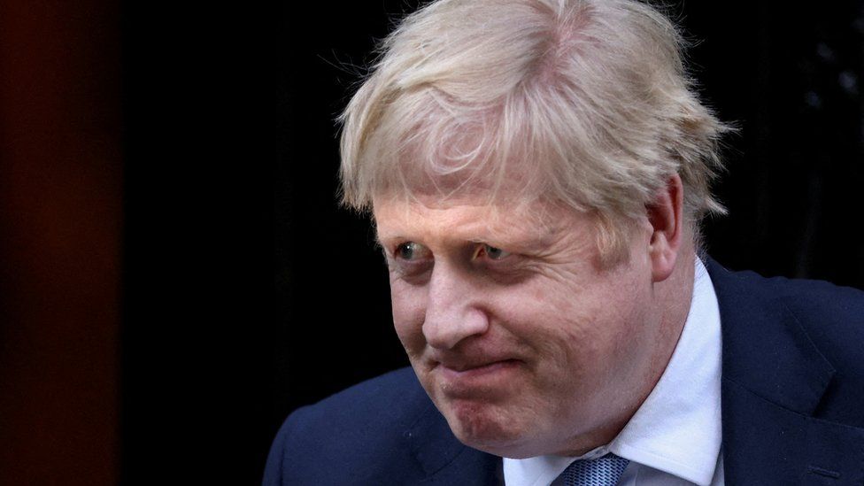 British Prime Minister Boris Johnson walks outside 10 Downing Street in London, Britain, January 31, 2022