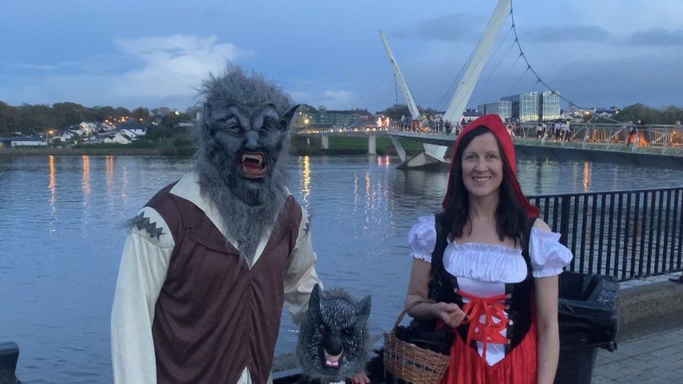 People in costume near the River Foyle