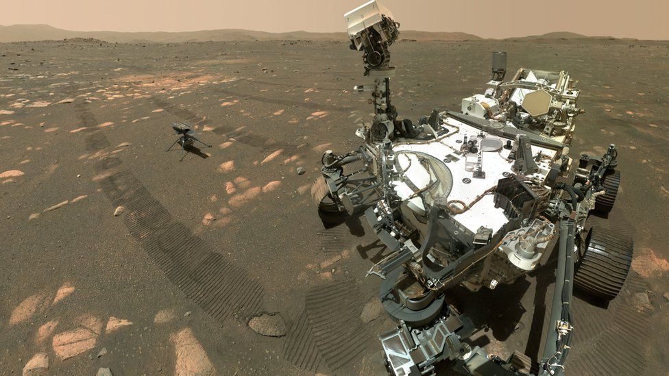 Selfie of helicopter and rover