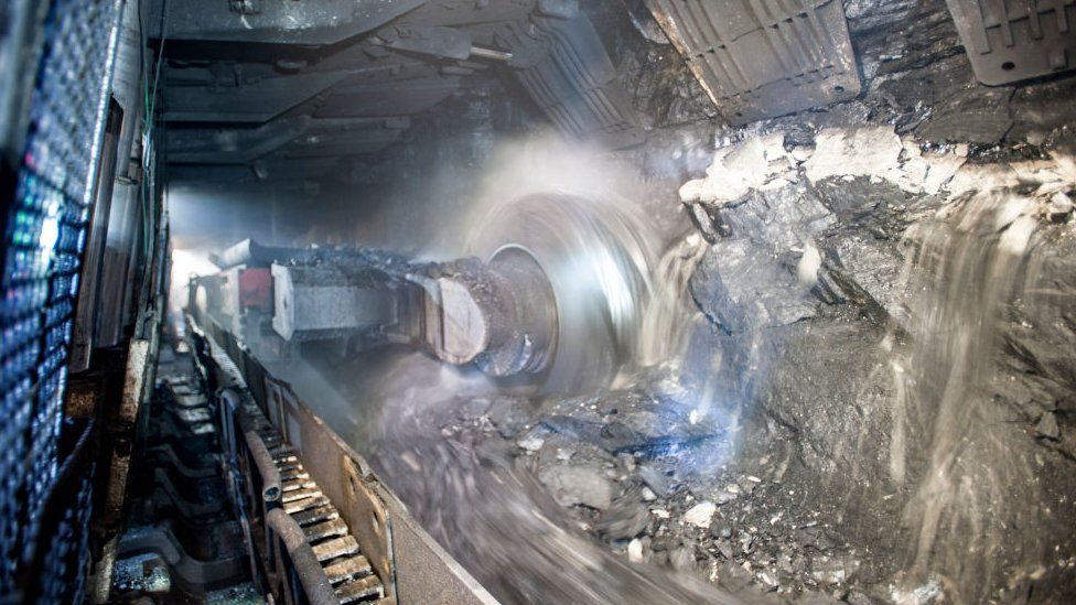 A coal-cutting machine in a tunnel at a coal mine operated by Beijing Haohua Energy Resource co.