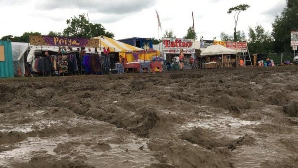 Conditions on the festival site are muddy