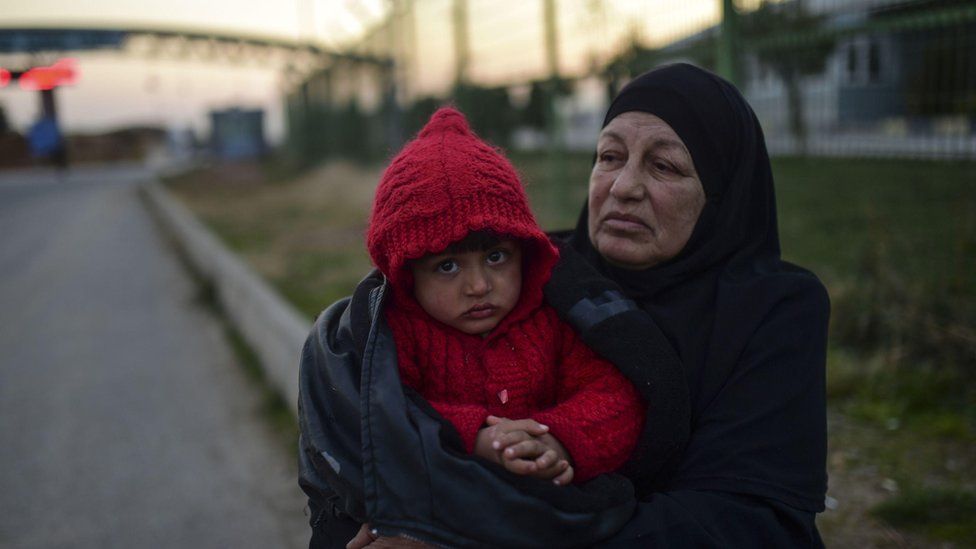 Syrian refugees on the Turkish side of the border, waiting for family members still in Syria (10 Feb)
