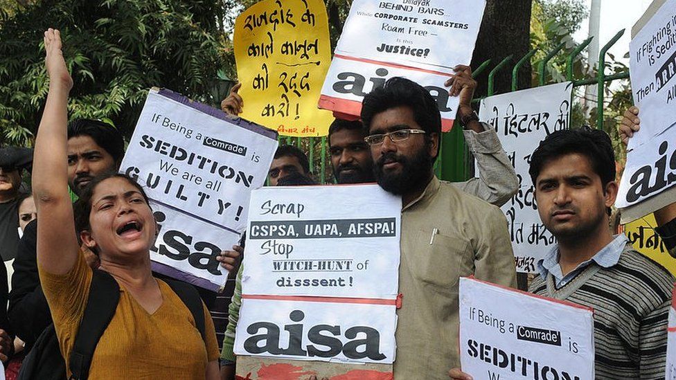 Protesters shout anti-government slogans in New Delhi on February 12, 2011 during a protest against the life sentence handed down to doctor and social activist, Binayak Sen, on charges of sedition in Chhattisgarh state.