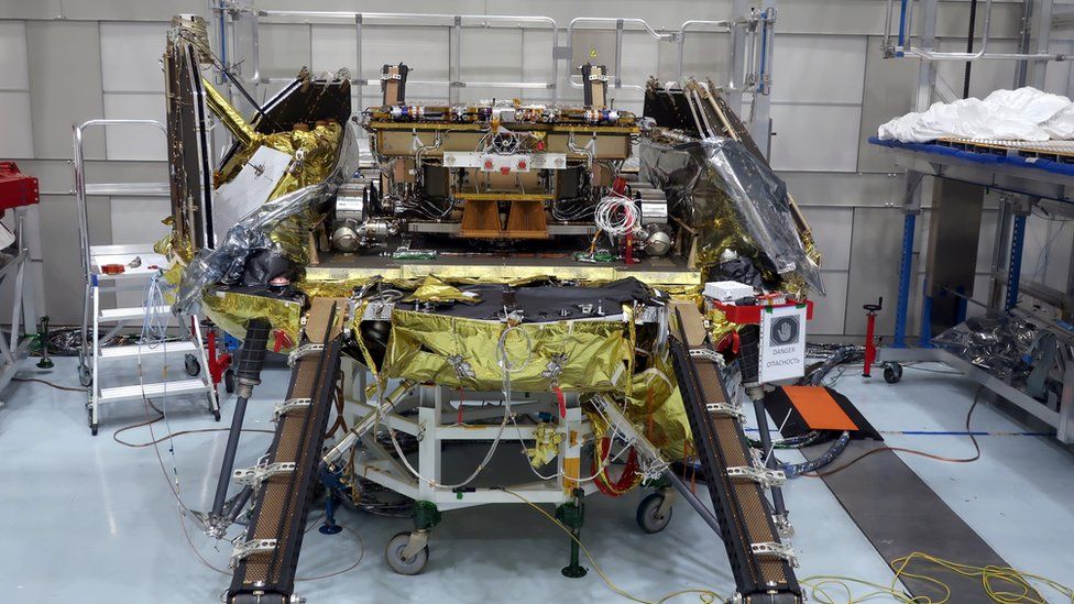 The rover pictured face on in a laboratory