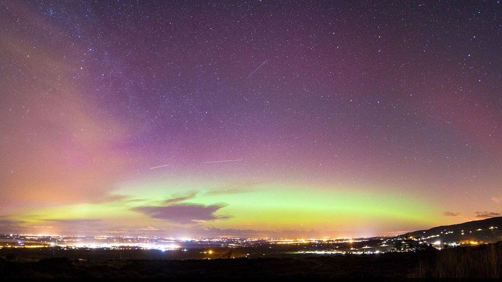 Northern Lights shine in the night sky over Wales BBC News