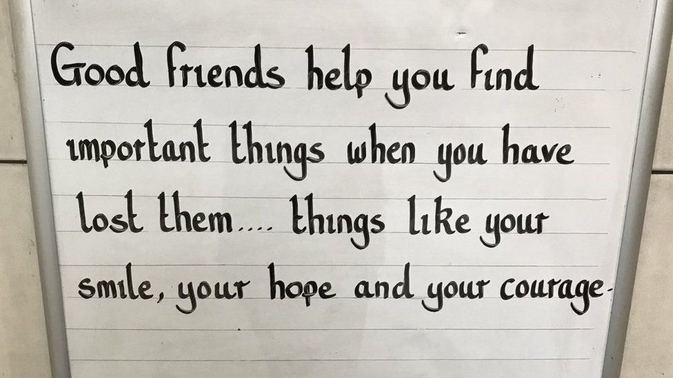 Inspiring message at the Oval station which says: Good friends help you find important things when you have lost them... things like your smile, your hope and your courage
