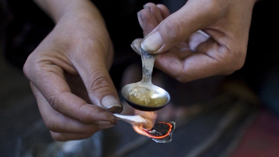 Heroin being mixed by a drug user, file pic