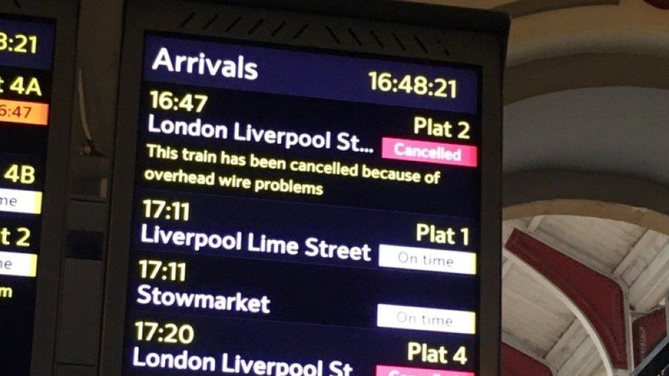 Arrivals board at Norwich station showing cancelled and delayed services.