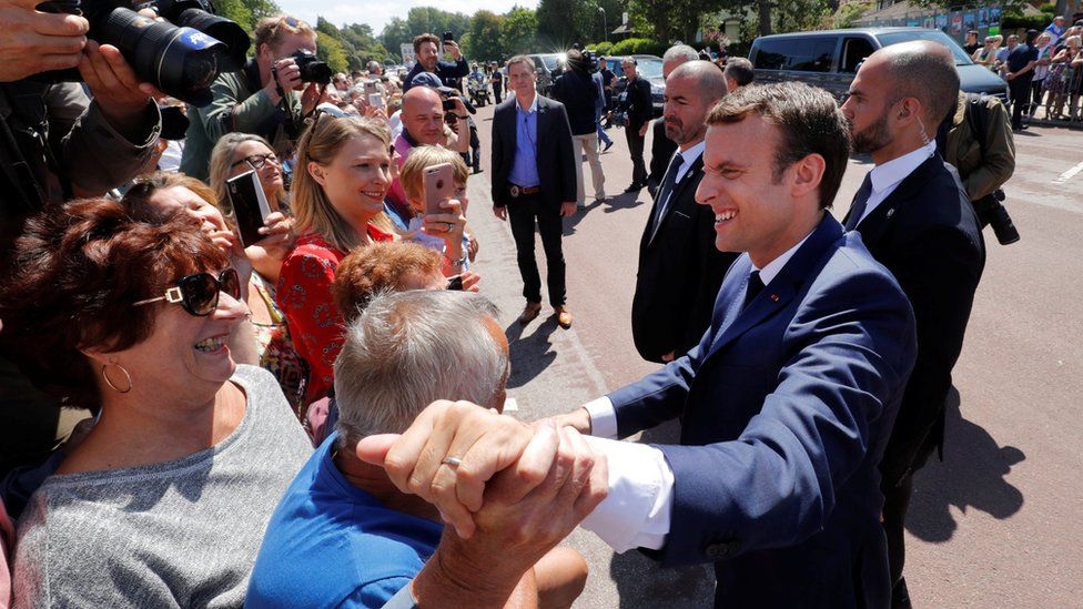 President Macron greets voters in Touquet