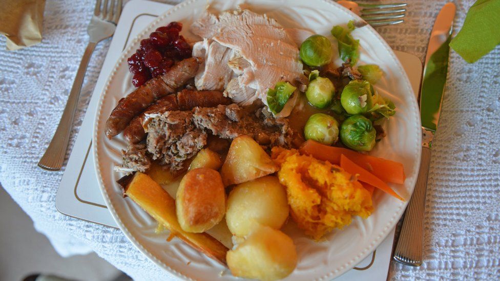 The British version of "pigs in blankets" seen on the left-hand side of the plate