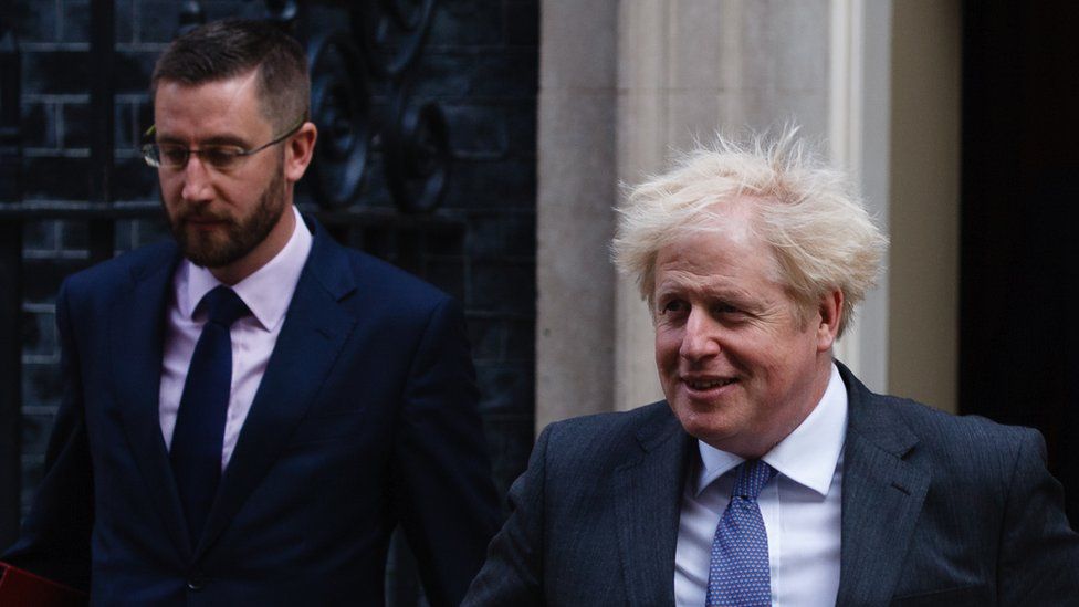 Simon Case and Boris Johnson