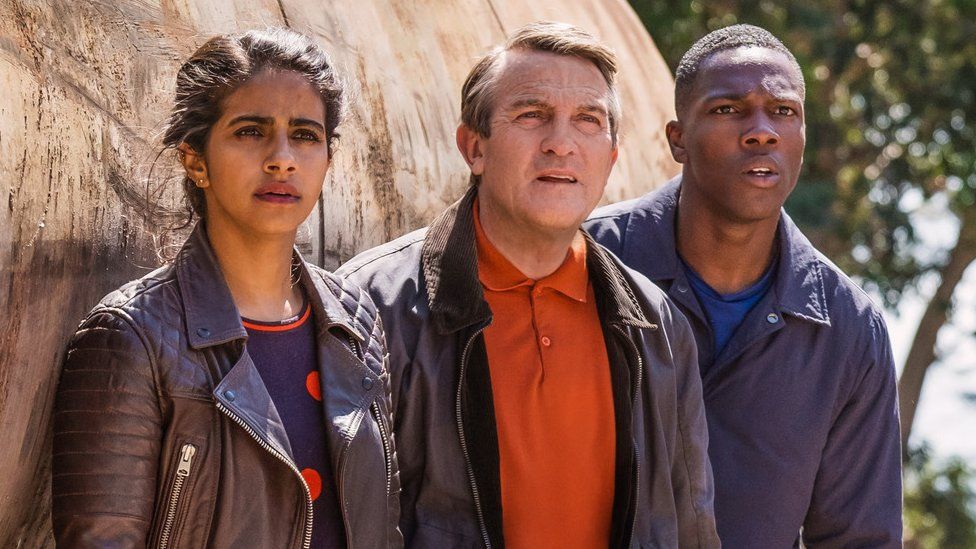 Bradley Walsh (centre) with fellow companions Mandip Gill and Tosin Cole