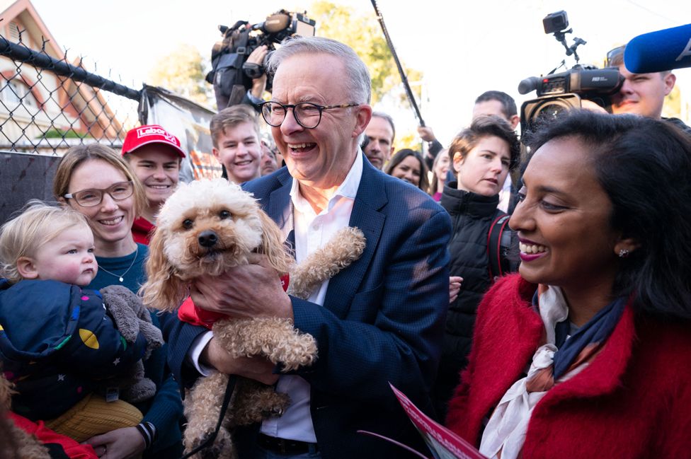 Anthony Albanese and Labour candidate for Higgins Dr Michelle Ananda-Rajah arrive at a polling station during election day in Carnegie, Melbourne, Australia on 21 May 2022