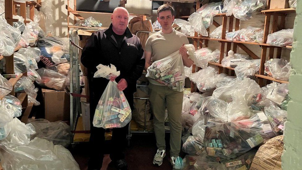 Michael Hearty, Public Protection Enforcement Officer and Cllr Harry Doyle with seized vapes