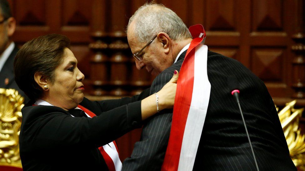 Pedro Pablo Kuczynski receives the presidential sash from President of Congress Luz Salgado