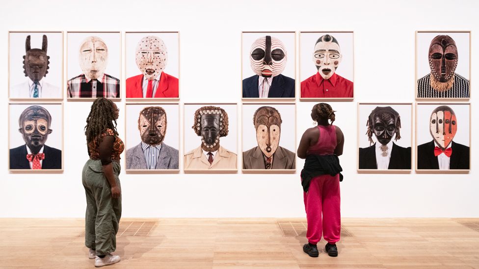 Installation view of Angolan photographer Edson Chagas's Tipo Passe (2014) at the Tate Modern