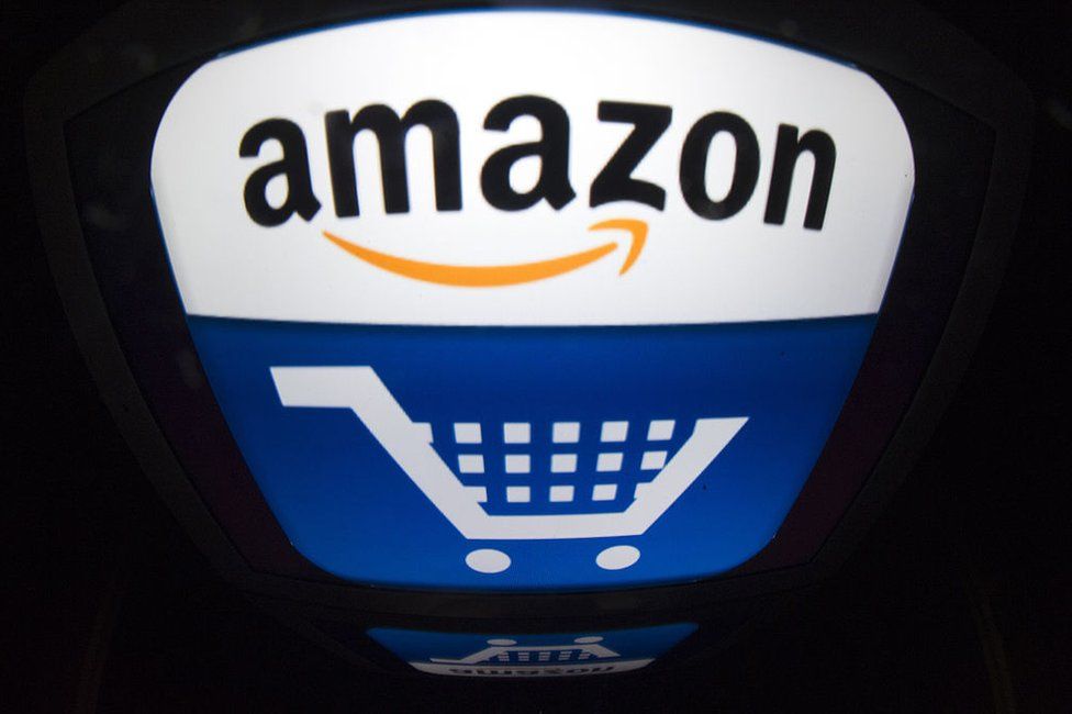 The Amazon logo with a shopping basket