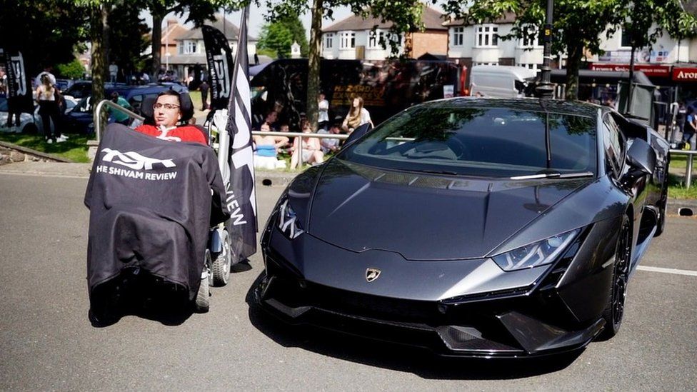 Shivam next to a Lamborghini