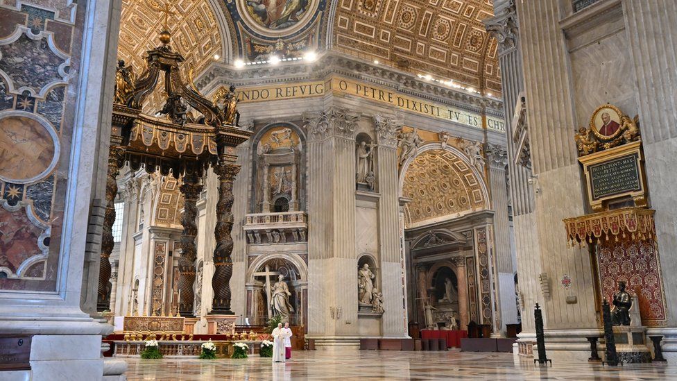 Pope Francis reads his "Urbi et Orbi" ("To the City and the World") message in St. Peter's Basilica