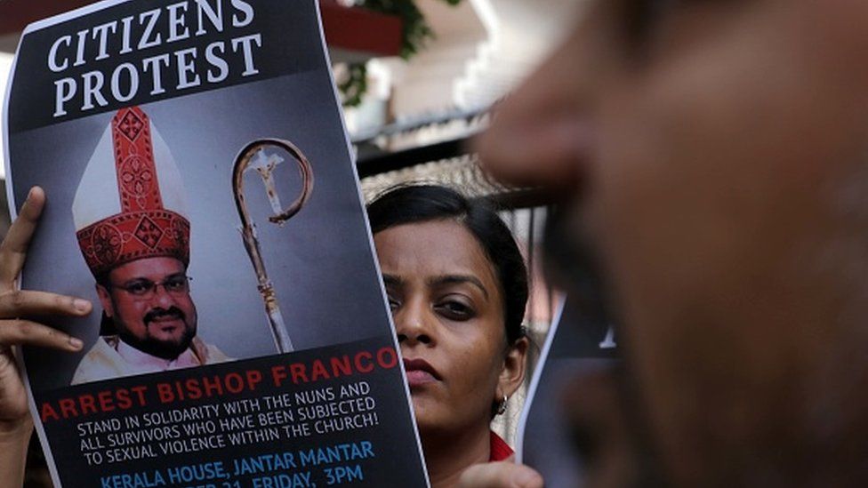 People hold a protest against Bishop Franco Mulakkal for his arrest outside the Kerala House, on September 21, 2018 in New Delhi, India.