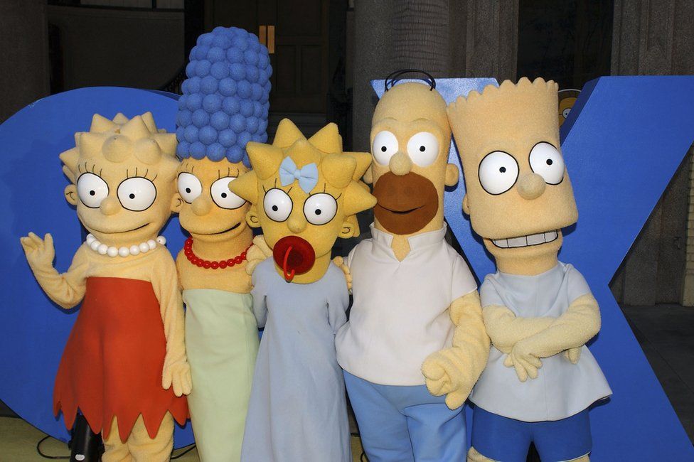 The Simpsons characters Lisa, Marge, Maggie, Homer and Bart Simpson pose for a photograph at 'The Simpsons' 350th episode block party on April 25, 2005 in Los Angeles, California