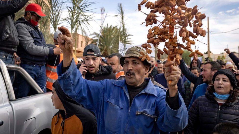 Moroccan farmers protest in the border city of Figuig on March 18, 2021, after Algerian authorities expelled the date growers from a border area they were traditionally authorised to farm in the Algerian territory